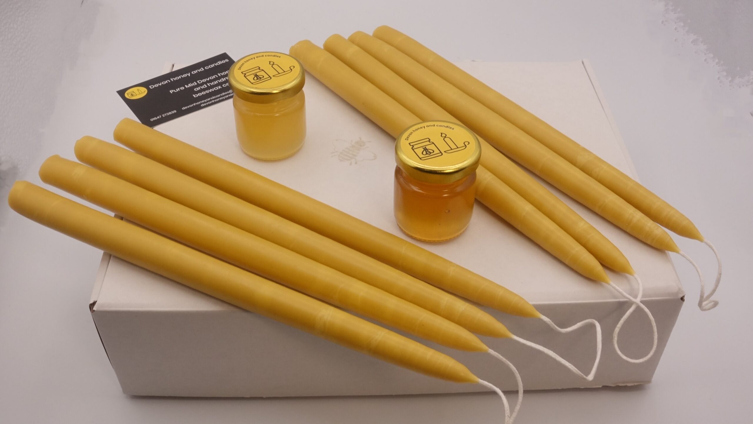set of 8 hand dipped candles and two 41ml jars of spring and summer honey