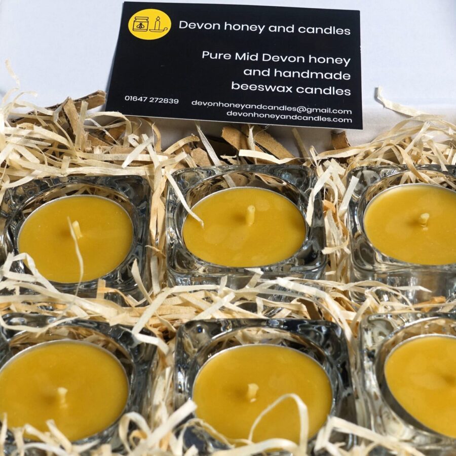 handmade beeswax candle in glass holders